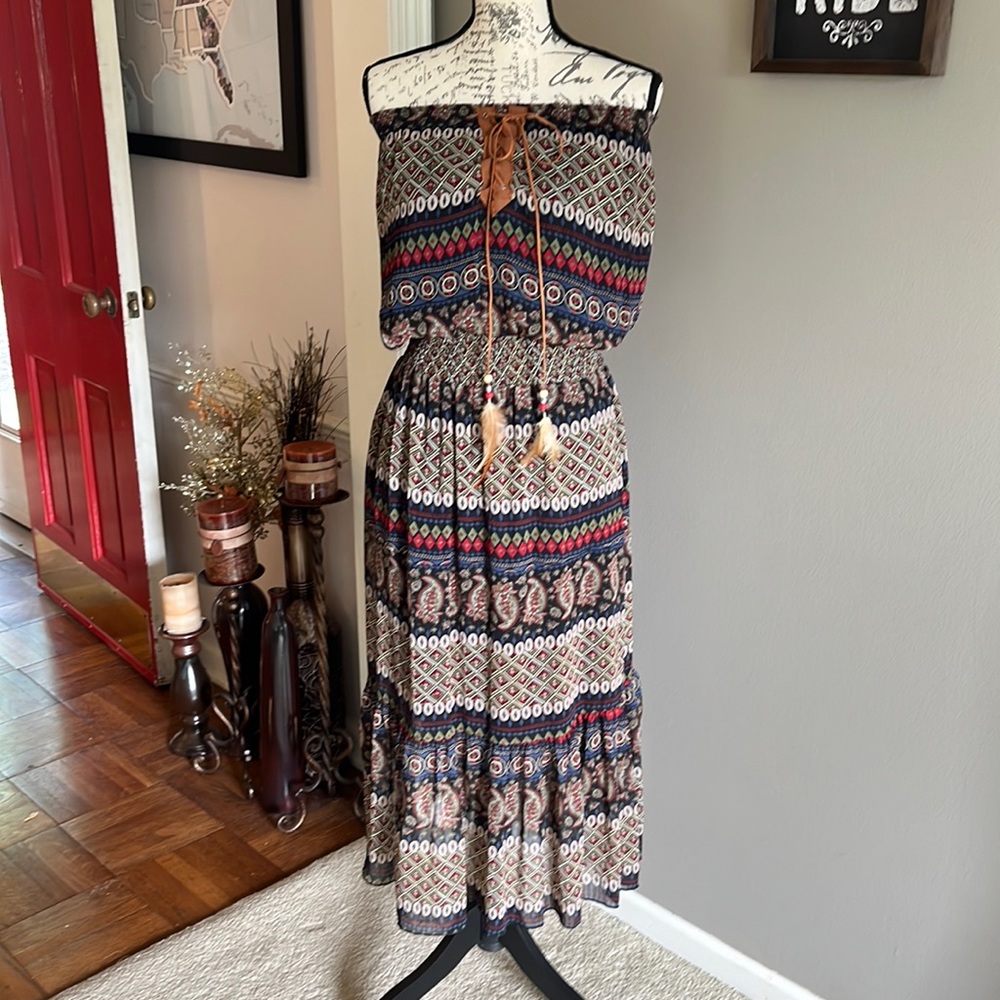 Large strapless Aztec print dress with lace up detail, feathers. Flattering EUC